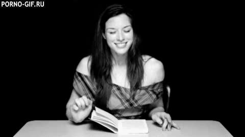 Woman reading book on the table