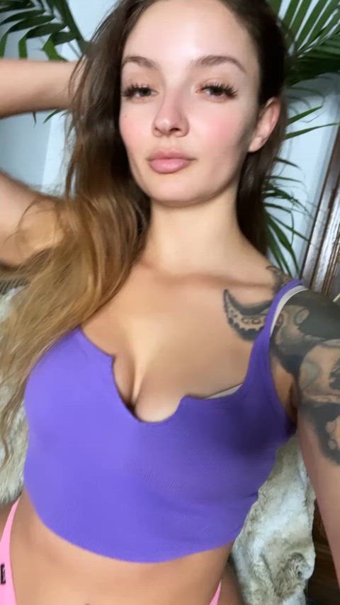 babe blonde cleavage tattoo tease teasing hot-girls-with-tattoos real-tease gif