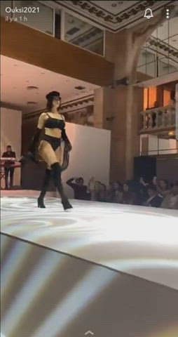 An elegant and provocative strut - or rather waddle - on the catwalk from a stacked