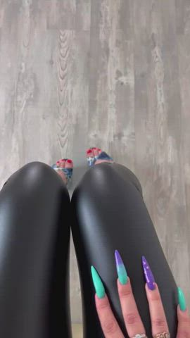 Shiny leggings and blue stripper heels