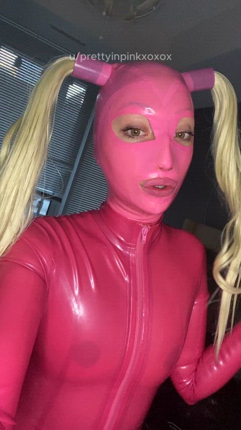 hood latex mask pigtails striptease tease gif