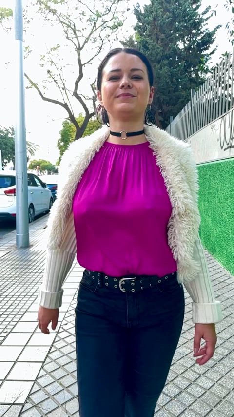 Slow-mo braless walk.