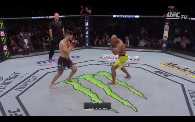 Jacare |Weidman| Jacare immediately with strong pressure