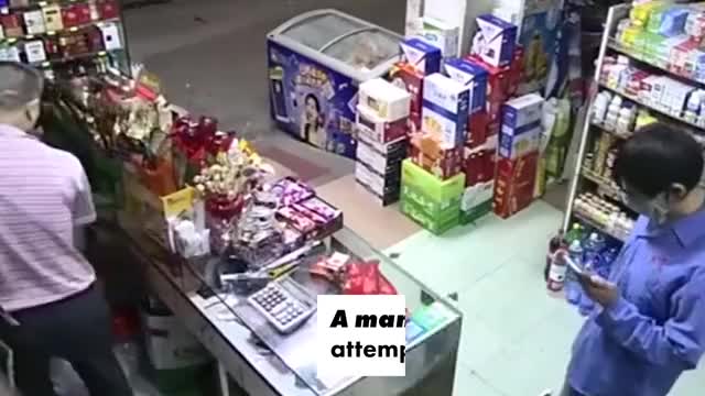Shopkeeper beats the crap out of armed robber