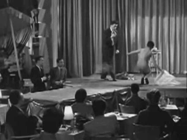 Brigitte Bardot (and other nude extras) in the 1956 striptease sex comedy "En