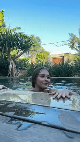 bouncing tits swimming pool tanlines gif