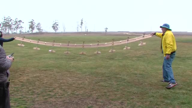 Flexwing airplane made out of 9 smaller airplanes connected at wings