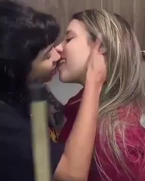 Two girlfriends making out...