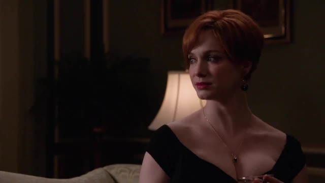 Christina Hendricks's heaving breasts move just from her breathing