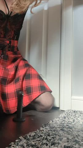 Wearing a sexy outfit, sitting down on a little dildo feels good