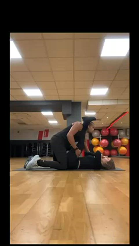couple doggystyle gym stretching gif
