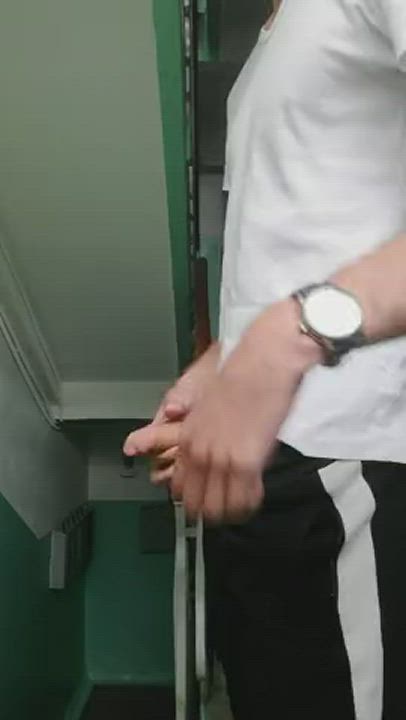 Boy jerking off in the stairwell