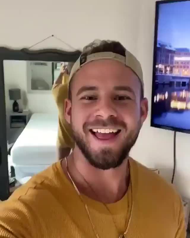 Teasing jock under yellow shirt