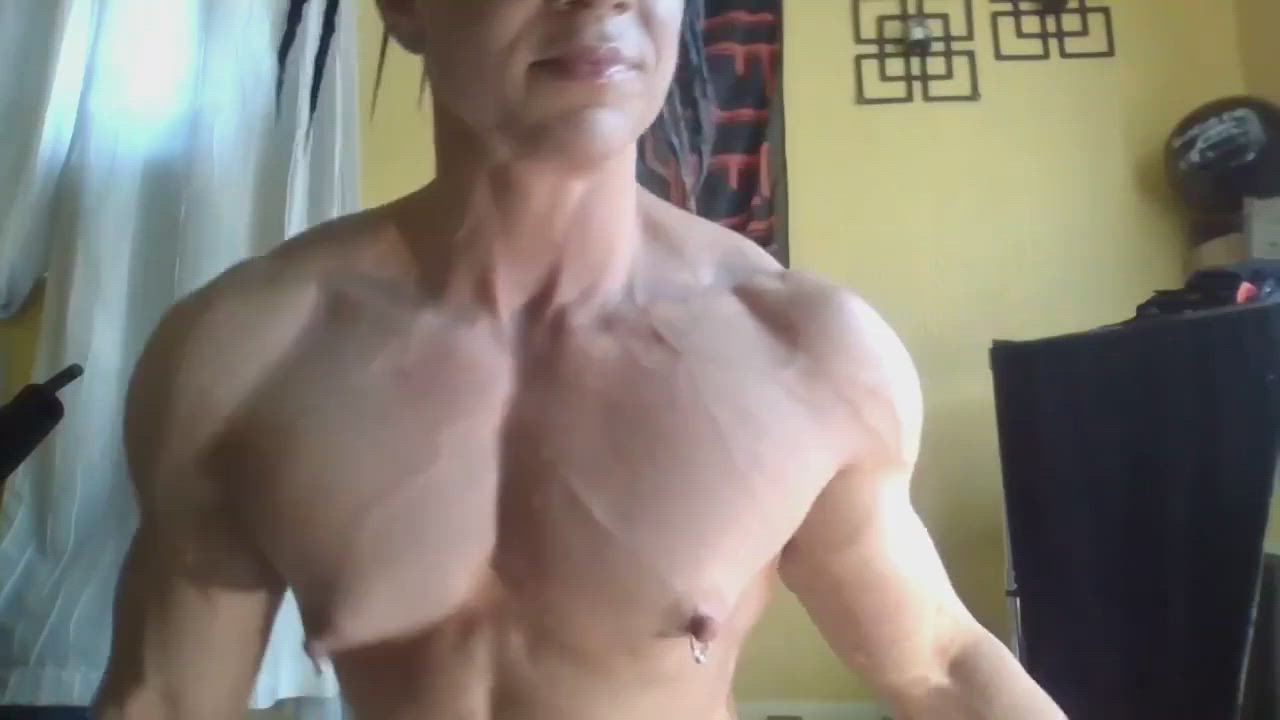 rock hard, veiny pecs.