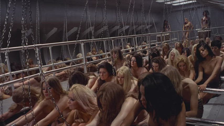 Raquel Welch Forces Some Topless Women to Row a Ship in the Magic Christian [1969]