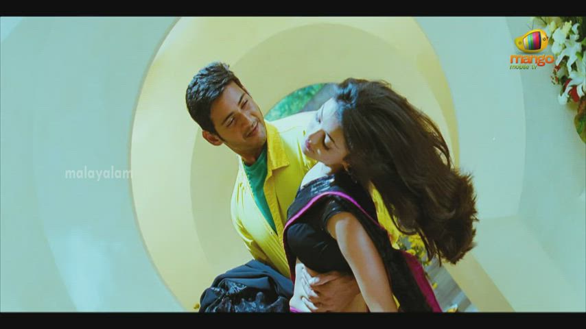 Mahesh Babu playing with a sleeping Kajal Aggarwal