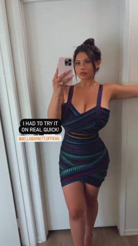 Talk about a classy big titty women trying a dress on quick! :)