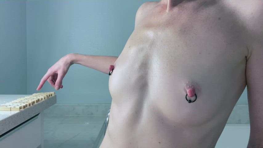 Clothespin BDSM nipple play