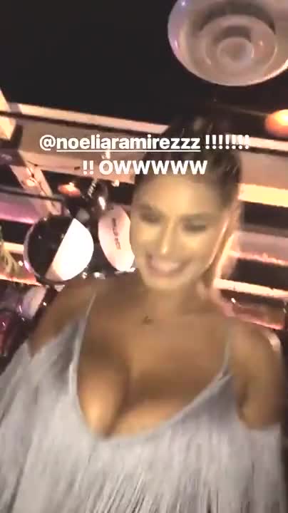 Shaking her massive jugs