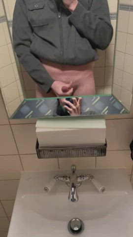 Cuming on mirror in london bar restroom (31m)
