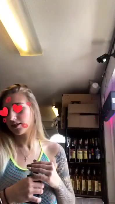 Bikini Barista flashing a customer