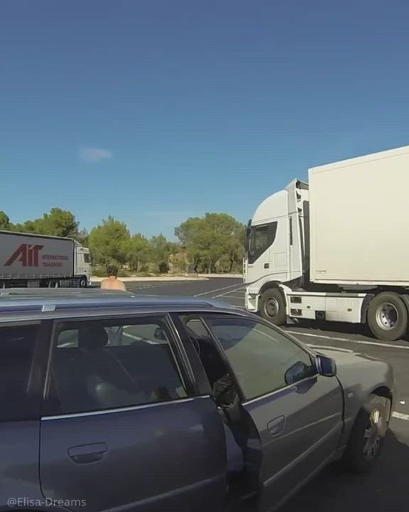 Elysa play with her anal toy in front of lucky truck drivers on the parking (Elisa