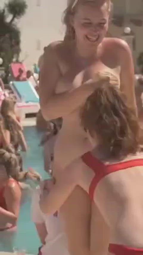 Friends help her strip naked at the pool party