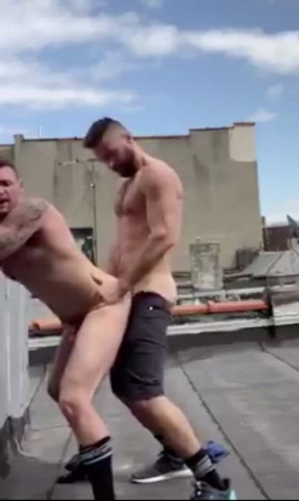 Straight friends sneak up to the roof to have some fun