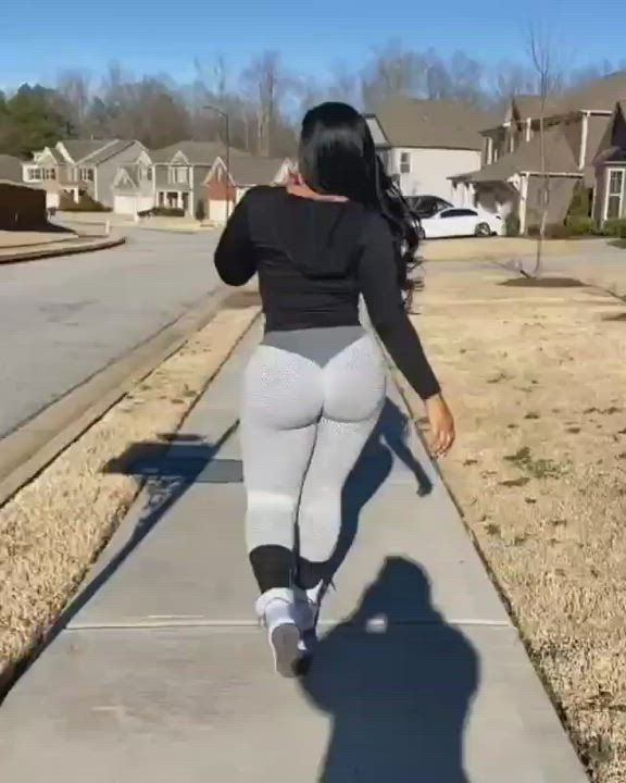 Showing off big butt in tights
