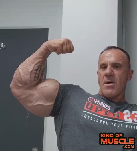 Daddy's huge bicep