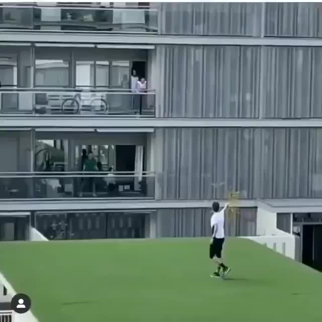 Seville, Spain during quarantine. A fitness instructor hosts a workout on a rooftop