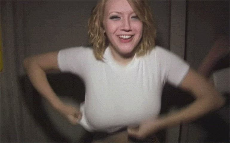 amateur big tits blonde busty flashing laughing smile gif