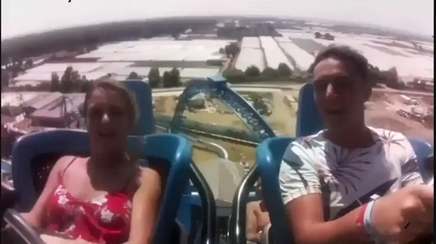 Sundress fails on rollercoaster.