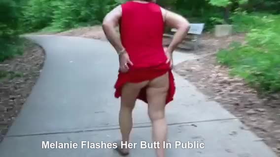 Melanie Lifts Dress Exposing Her Butt In Public