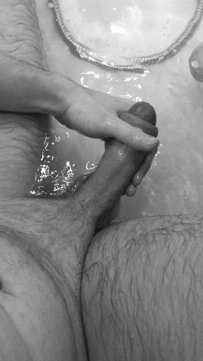 Stroking my uncut cock in bath