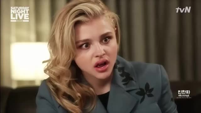 Chloe Grace Moretz eating a sausage