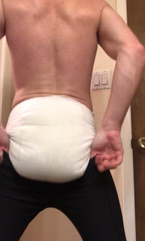 Testing the limits of these long-johns on his very full nighttime diaper before getting
