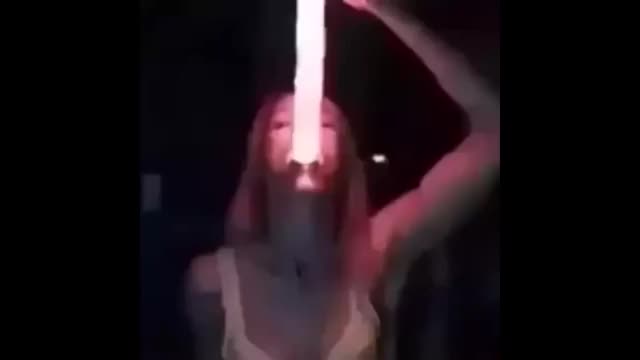 Slut deepthroating glowing dildo