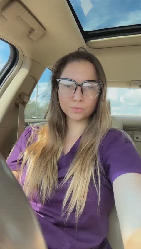 Just a nurse flashing her tits on the road to other drivers