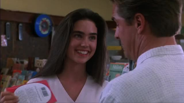 Jennifer Connelly - The Hot Spot (1990) - short clip of flirty looks in drug store