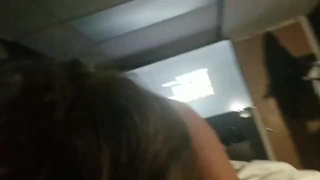 Asian diligently sucks while he watches TV