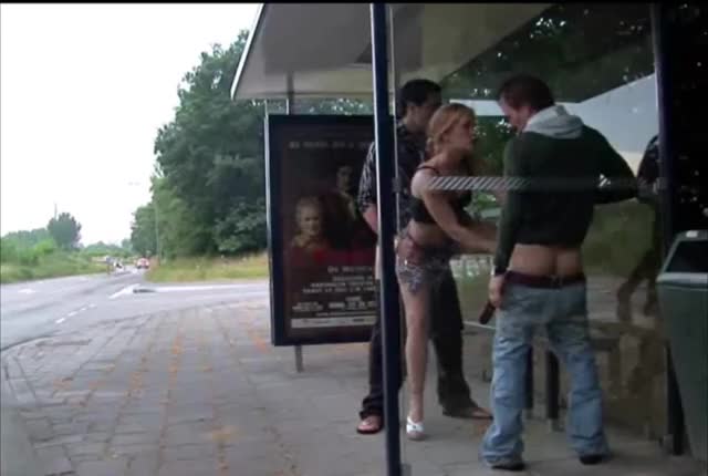 Girl Gets Both Ends Filled At A Public Bus Shelter