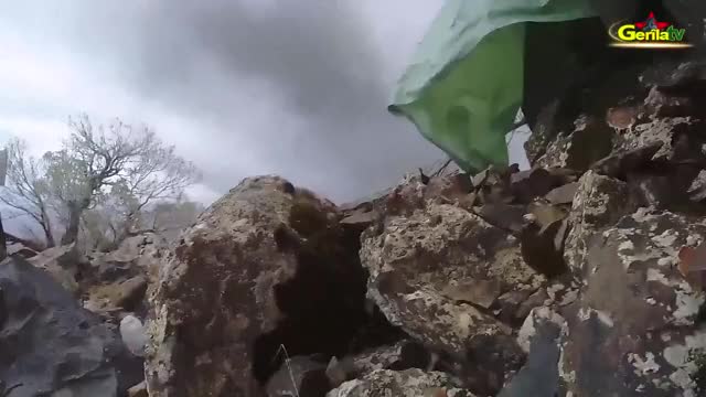 PKK fighters hit a Turkish outpost and grab weapons/ammo