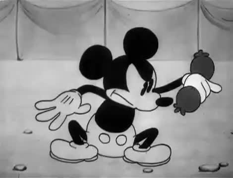 Mickey beats his meat.