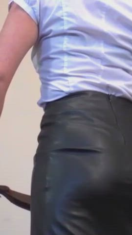 ass dominatrix femdom leather skirt slave whipped whipping gif