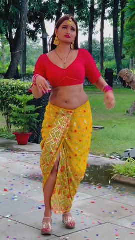 Neelam Giri navel in red blouse and yellow saree