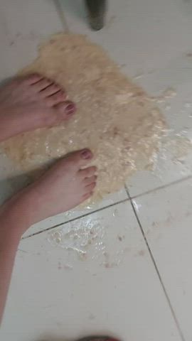 playing with the vomit and my feet