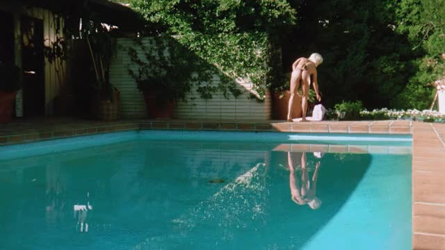 Julie K. Smith taking a dip in the pool