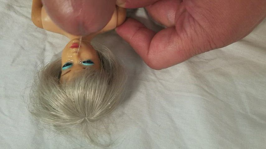 cumshot doll masturbating gif