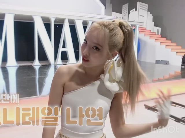 Nayeon is asking for it politely with her hair tied back. 🥰